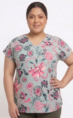 Woman wearing a floral patterned top on a white background
